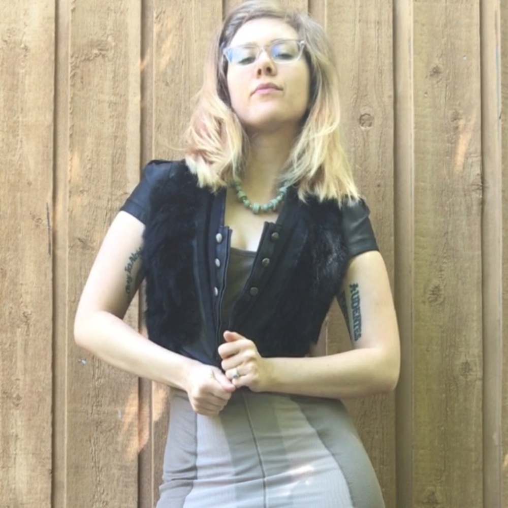 Black cap sleeve faux leather and fur vest