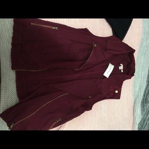 Maroon vest with floral detail