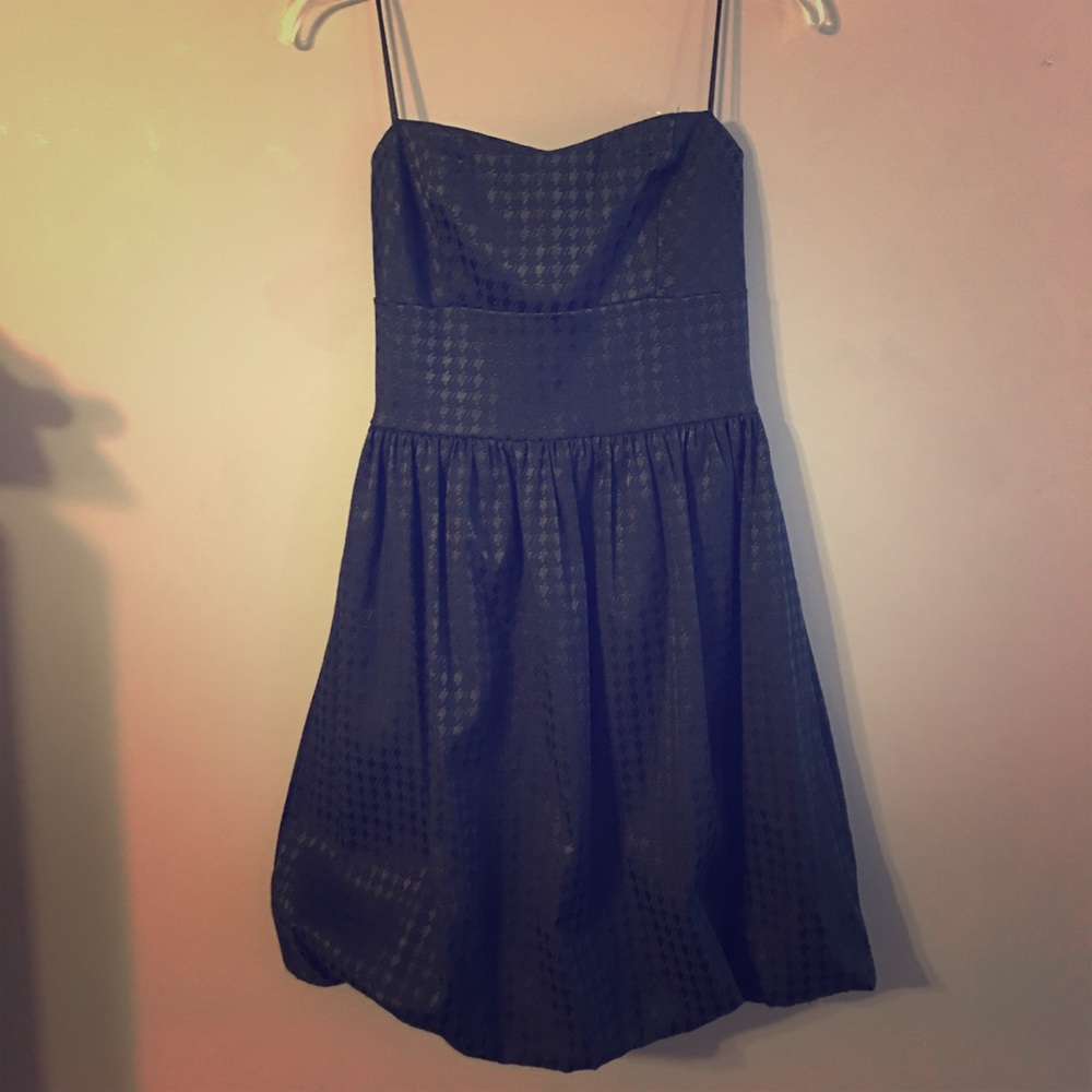 Selling a all black strapless dress