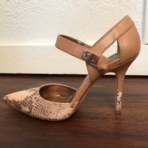 BCBG faux snake skin pumps