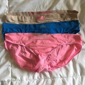 Three pairs of pink underwear