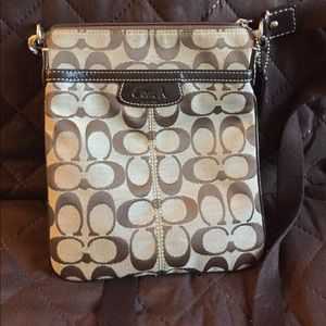 Brown Coach cross-body messenger bag