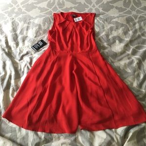 SLEEVELESS RED SATIN DRESS