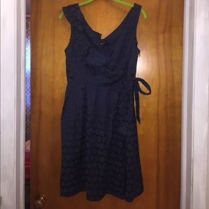 Blue polka dot dress with a side tie