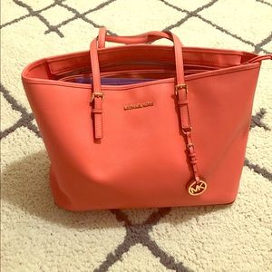 Huge Michael Kors tote. Pink/coral in color.