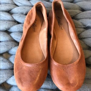 Brown leather flats