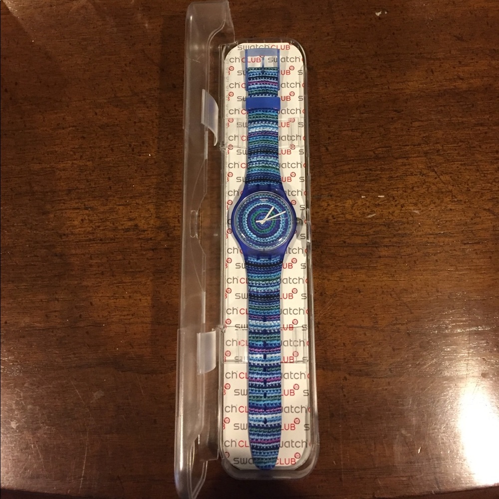 *authentic* SWATCH watch. Multicolored Blue