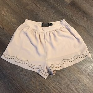Light pink H&M shorts with bead detailing