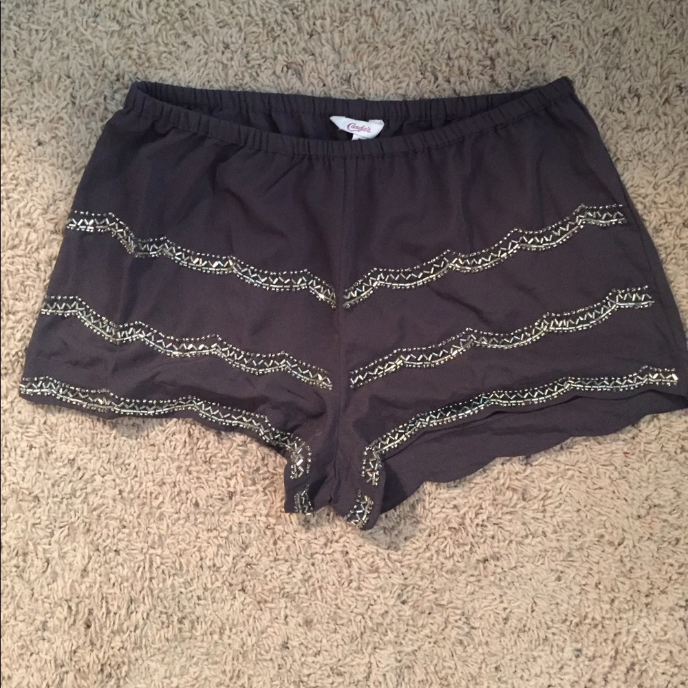Grey shorts with bedazzled decoration