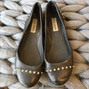 Black leather flats with gold studs