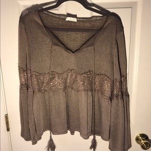 Tan, sheer bell sleeved top
