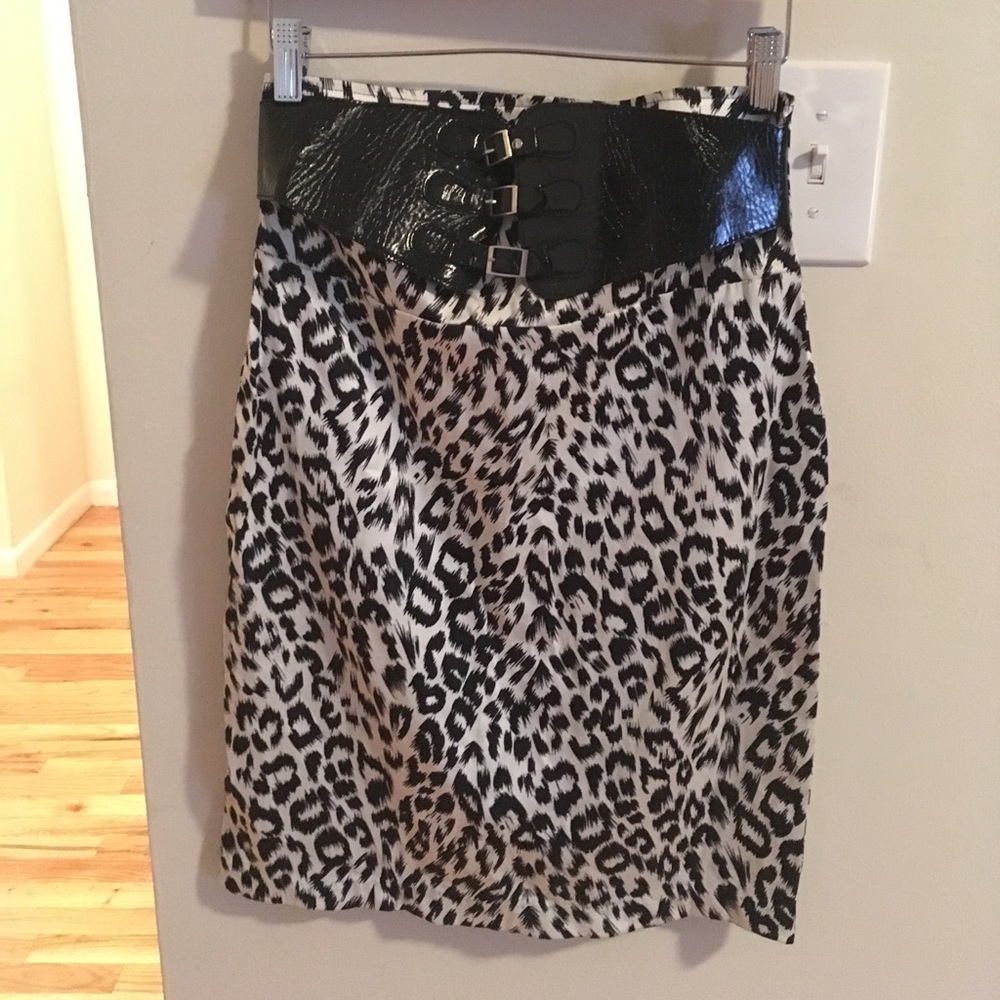 Belted, mid length skirt