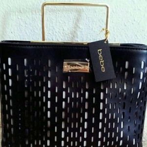 AUTHENTIC NWT BEBE ANIMAL PRINT HAND BAG