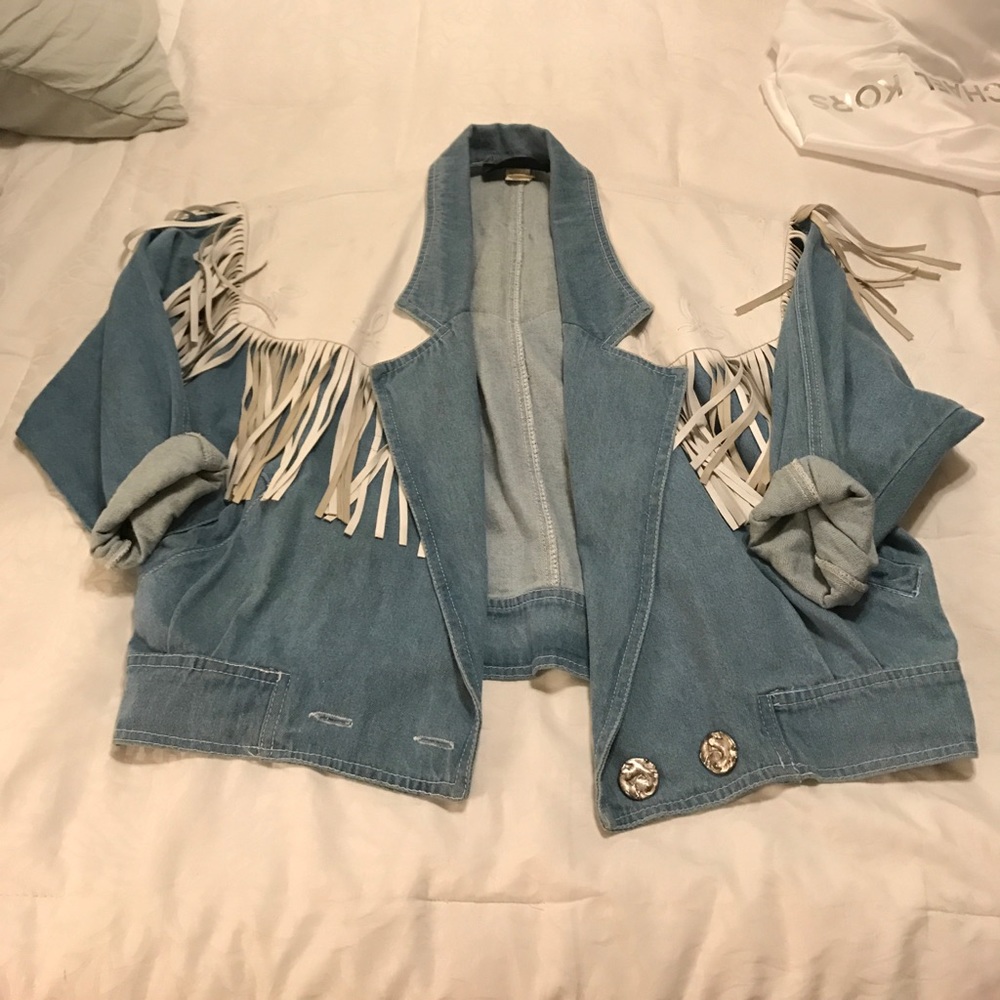 Vintage jean jacket with leather fringe