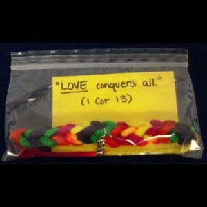 LOVE CONQUERS ALL Finger-woven Rainbow Bracelet