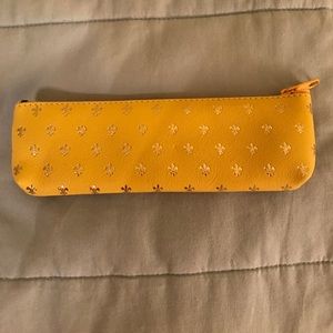 Yellow Fleur de Lis pouch bought in Italy