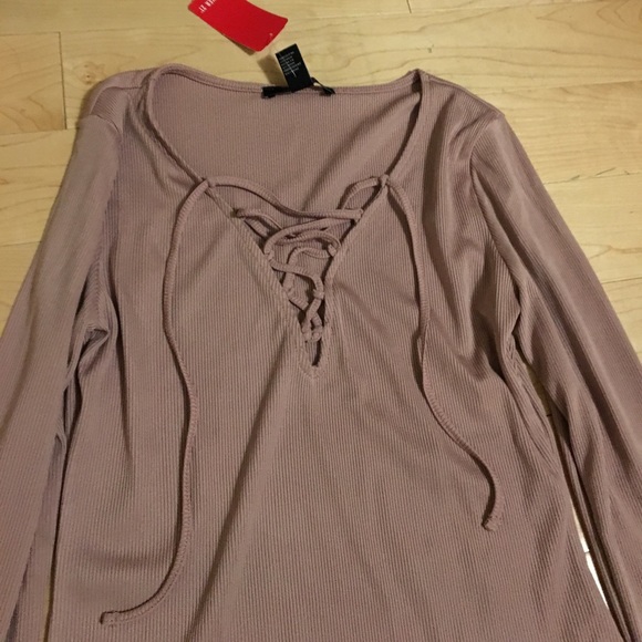 Forever 21 Tops - Pink body suit-never worn from Forever 21