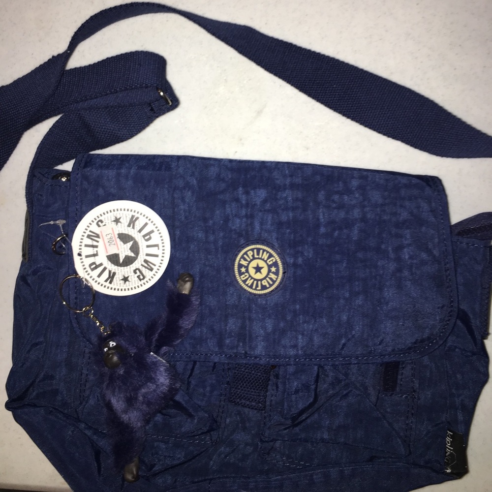 NEVER USED/ TAGS STILL IN TACT