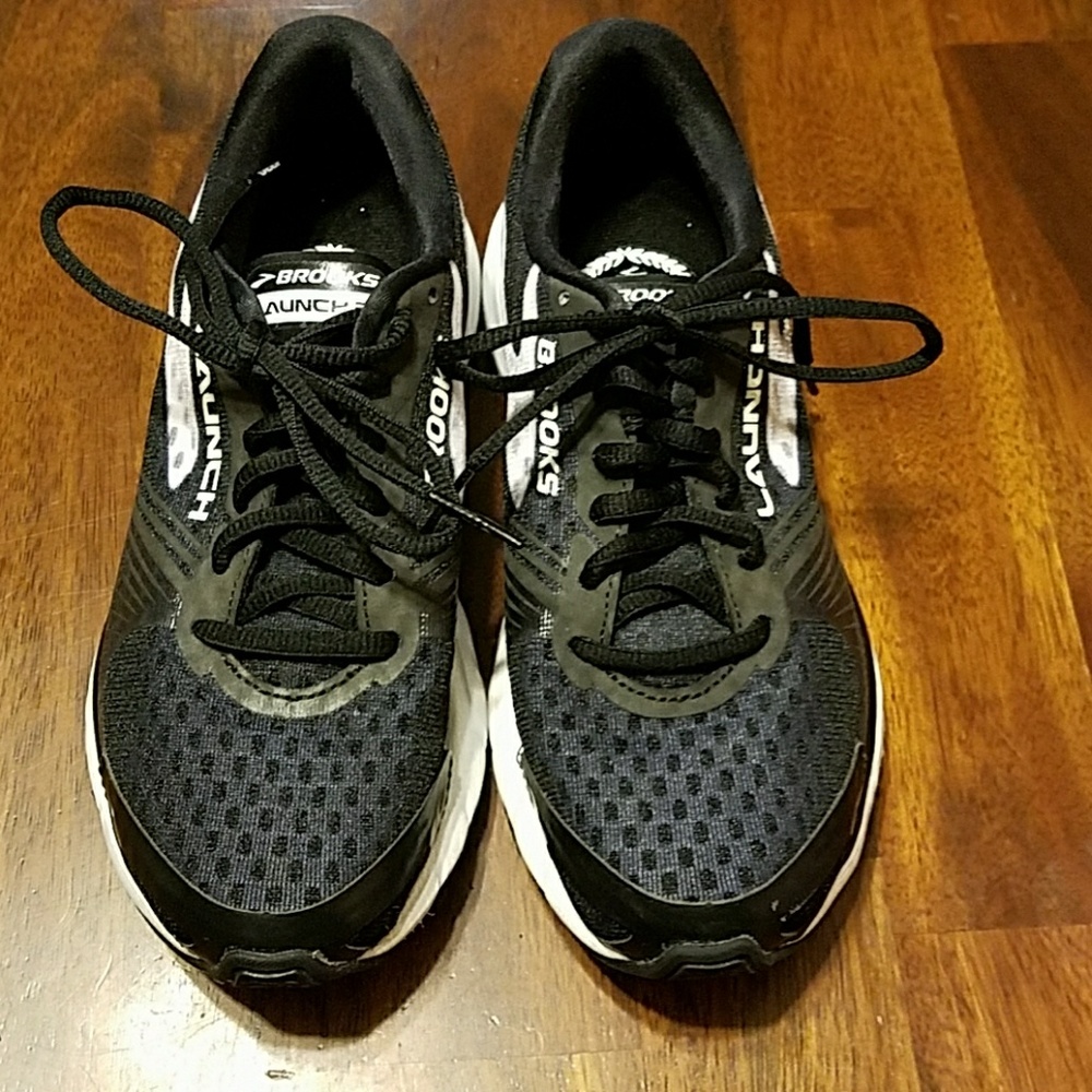 Black and white Brooks Launch running shoes