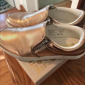 Metallic rose gold slip on shoes