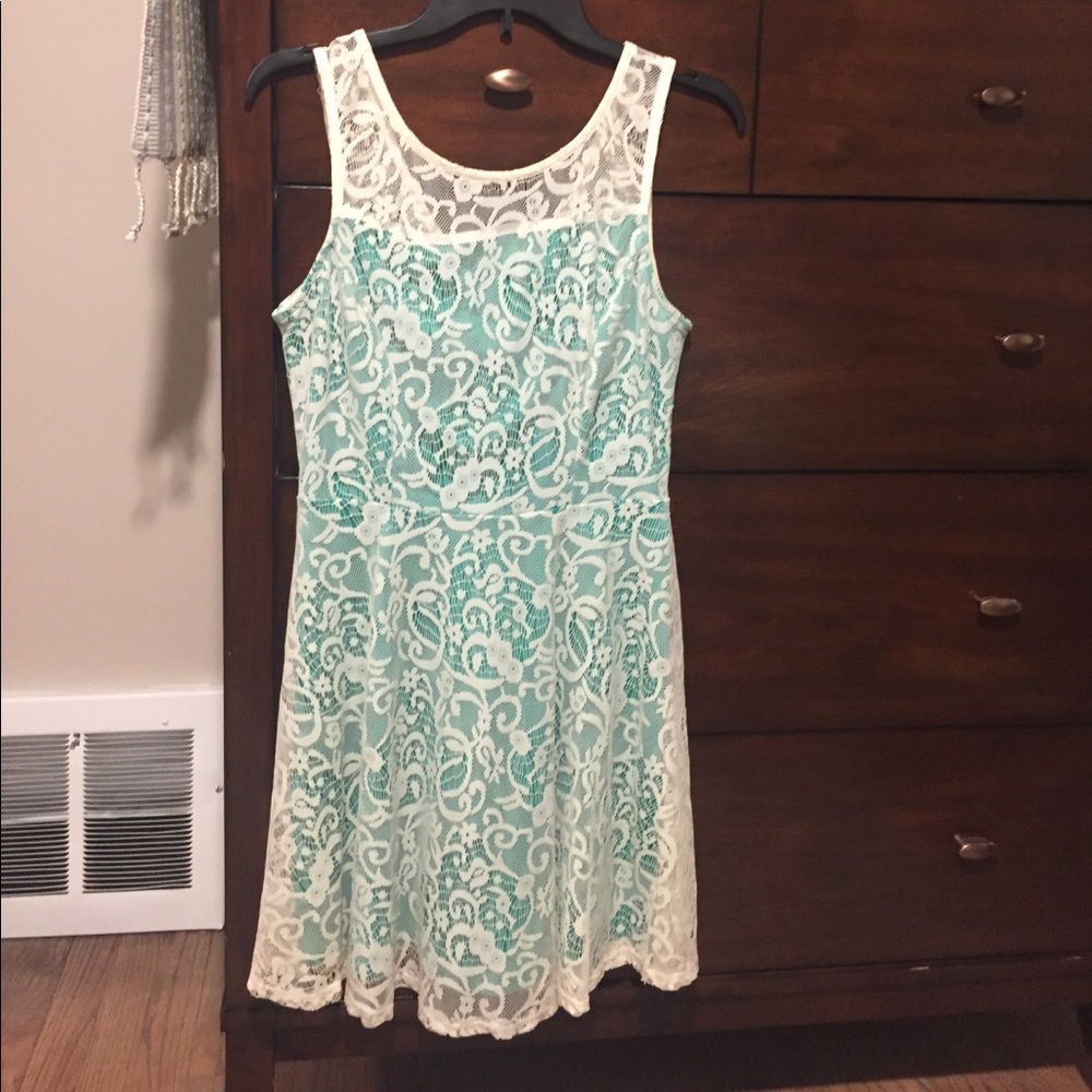 Lace and green strapless dress