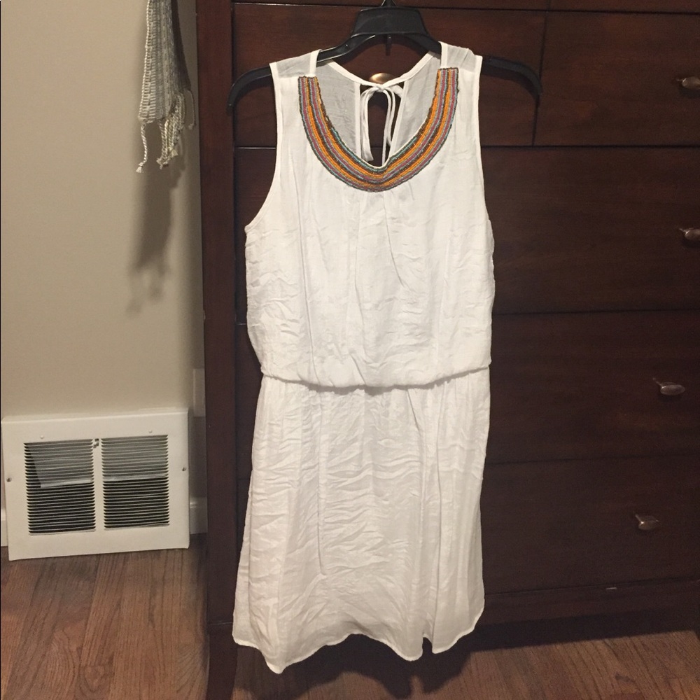 White dress with beaded neckline