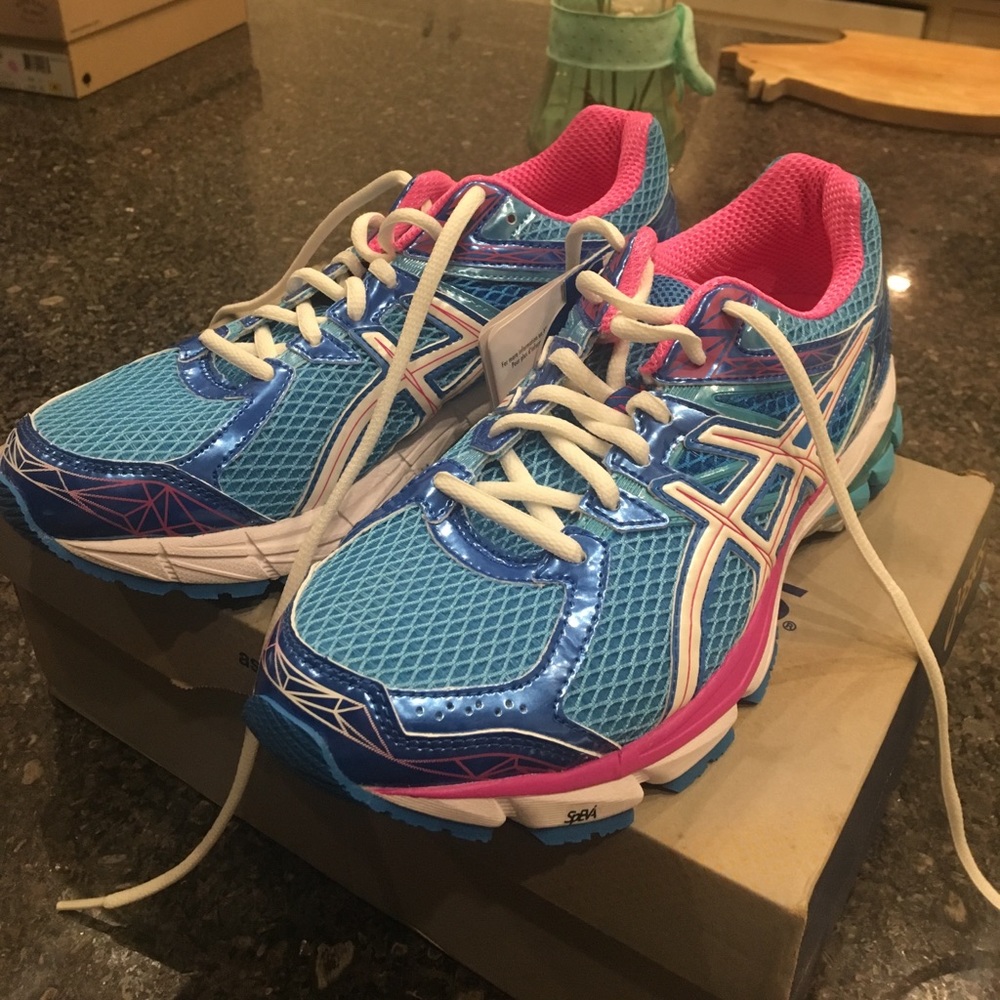 Blue and pink asics shoes