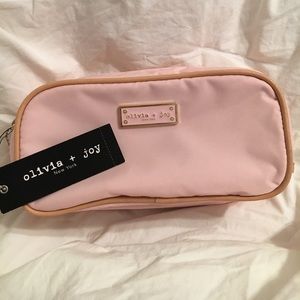 Olivia + Joy pink cosmetic bag