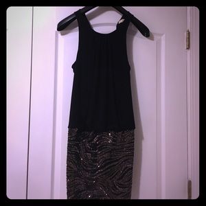 Black cocktail dress with gold sequins