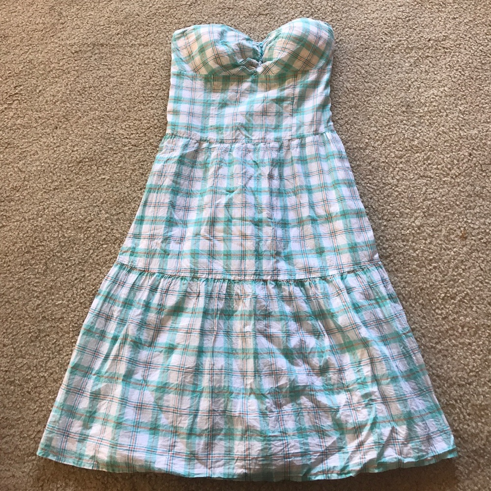 Light blue, white, and a little orange plaid dress