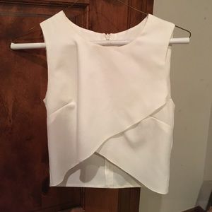 White asymmetrical crop top