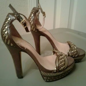 Crisscrossed, checker board style heels