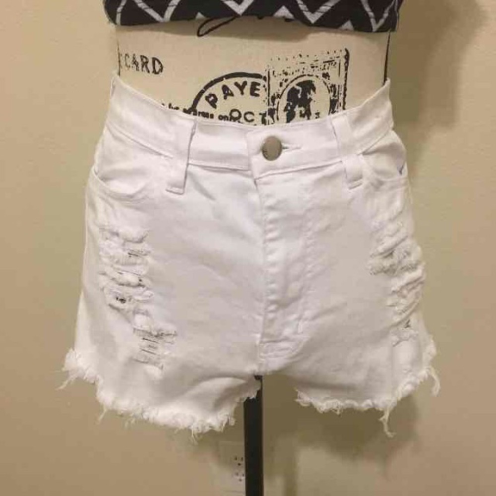 Distressed white shorts
