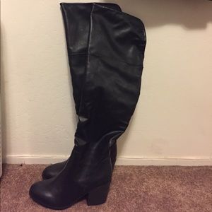 Black over the knee boots. Never worn