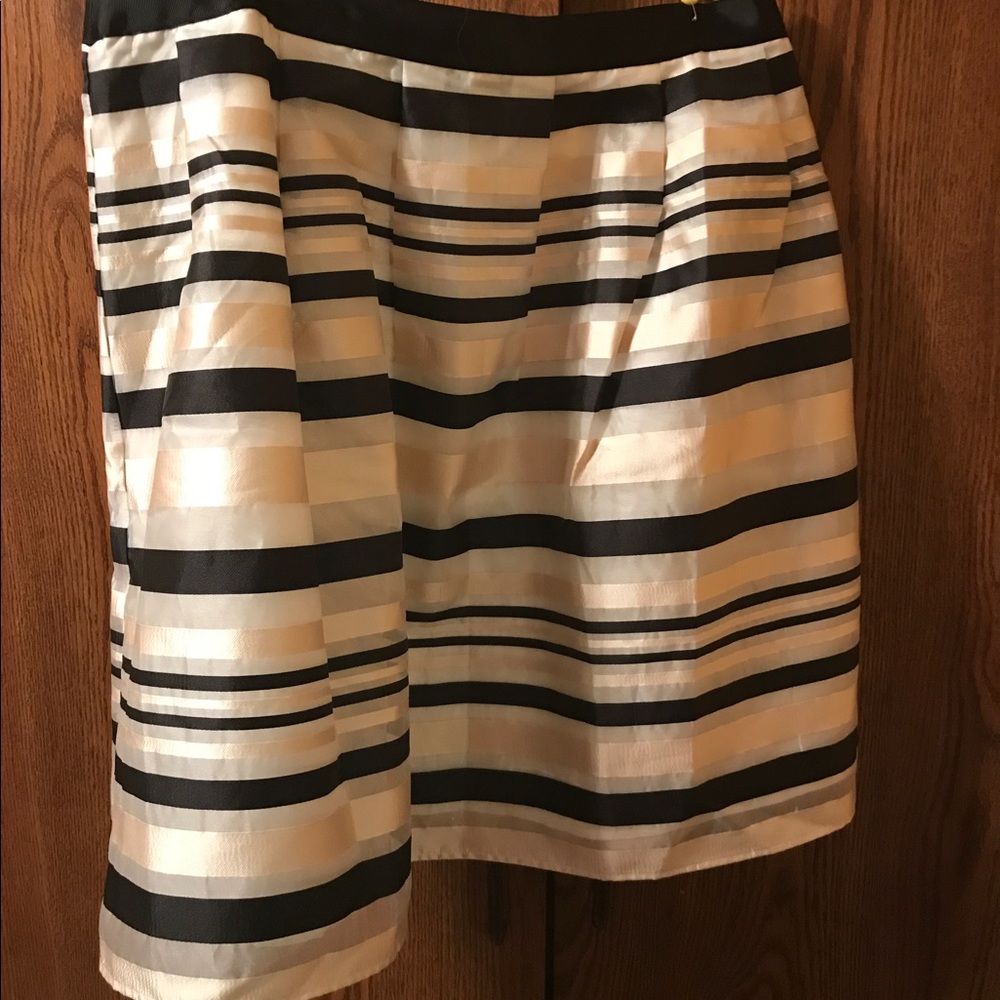 Cream/ black skirt
