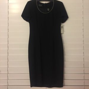 NWT Gorgeous little black dress with neckline