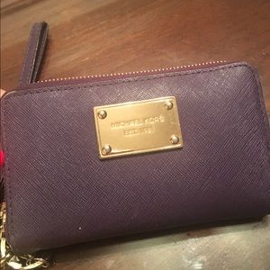Michael Kors dark purple wristlet