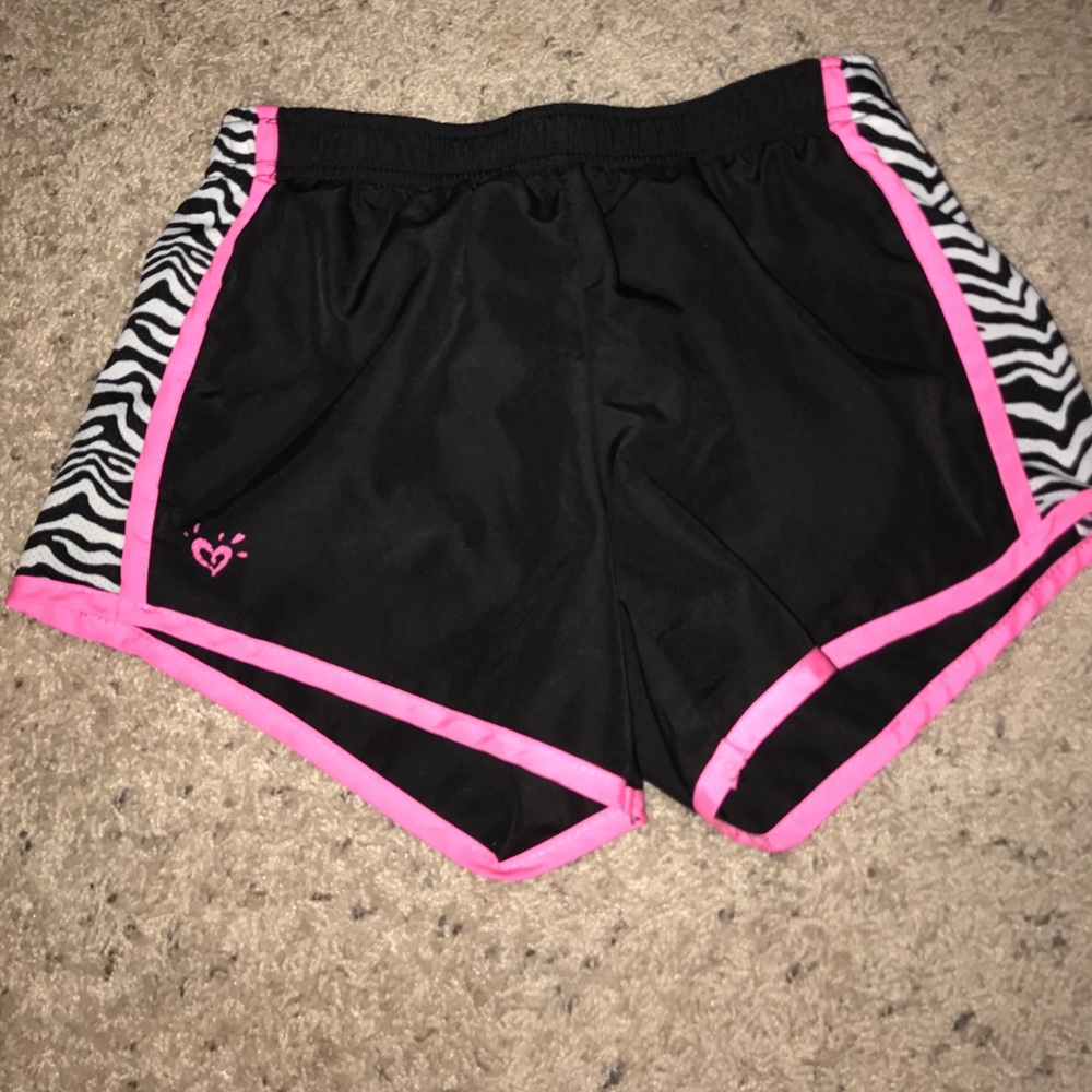 Black teach shorts with pink hem