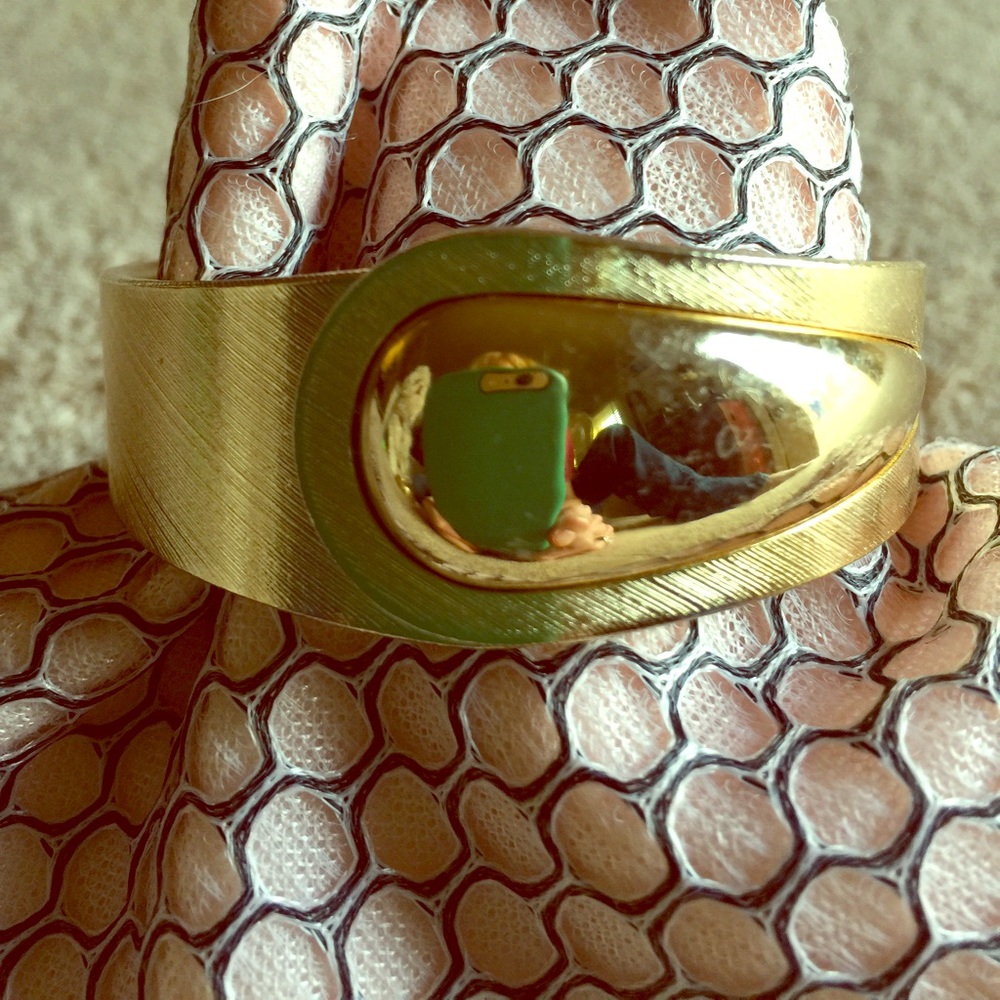Hinged bracelet signed