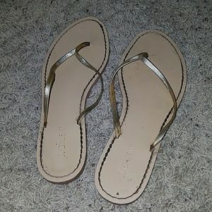 Gold flip flops
