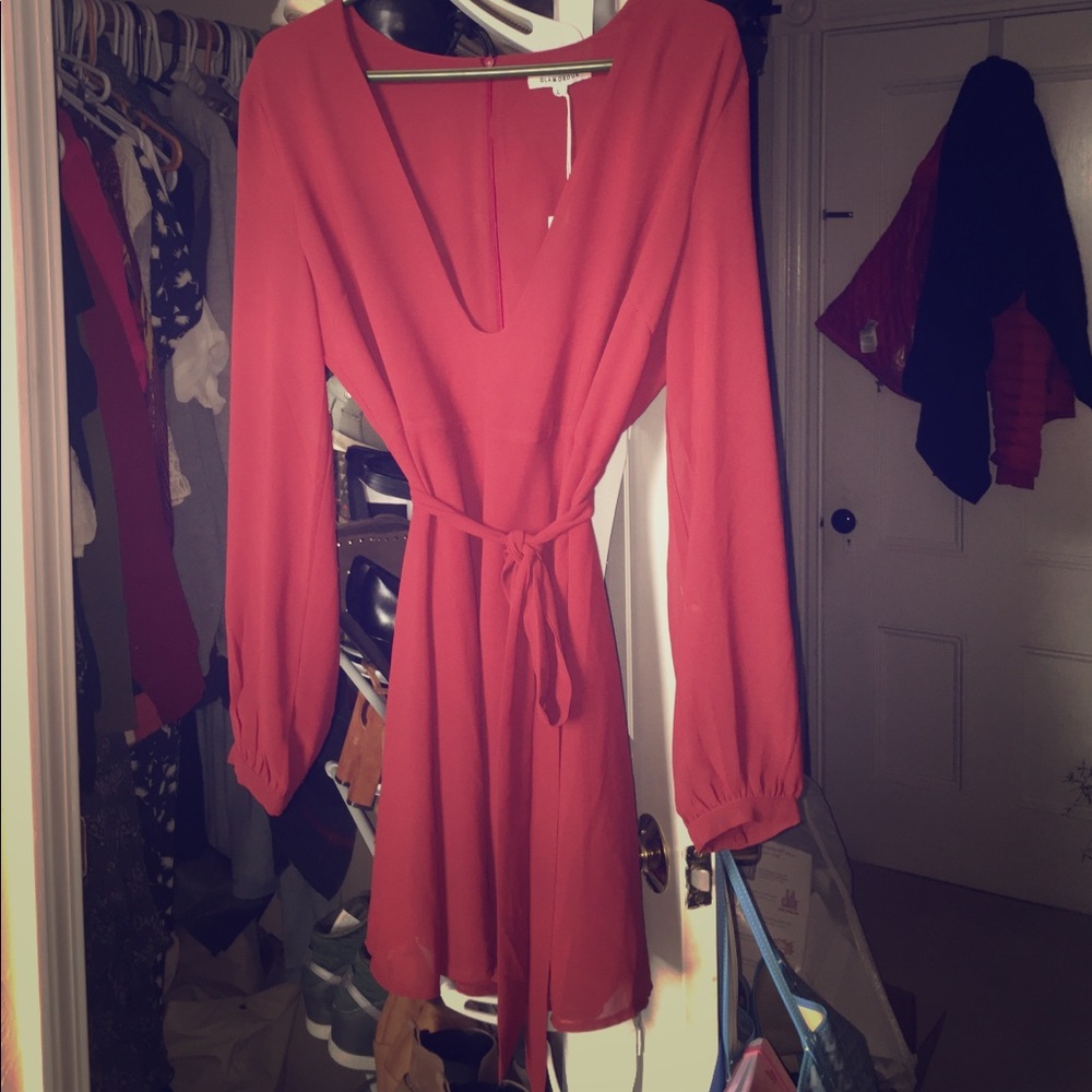 Long sleeve tea dress with plunging neckline