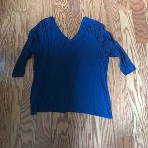 Blue blouse with lace sleeves and v neck