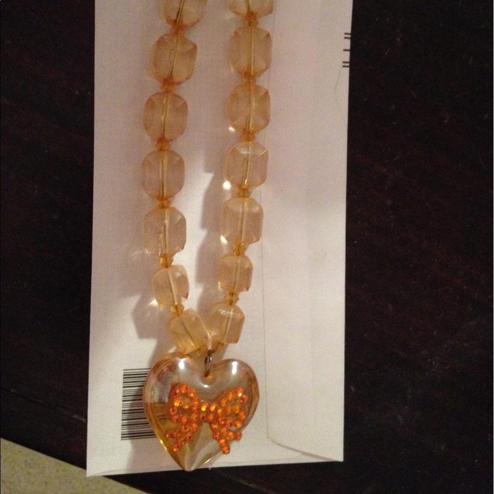 Big orange heart necklace with bow