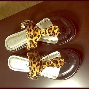 Leopard print flip flops