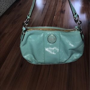 Real coach purse never used, light blue.