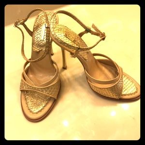 Michael Antonio gold and tan leather heels.