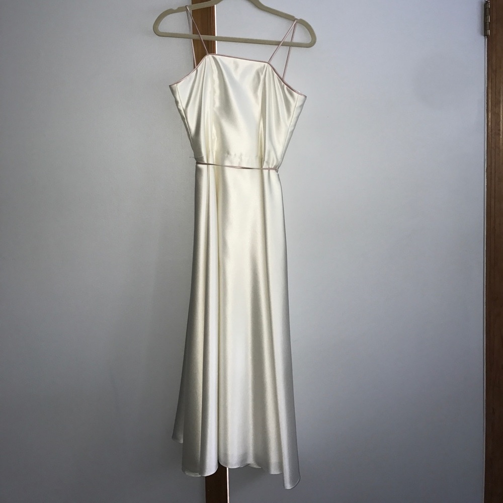 White silk gown with pink lining