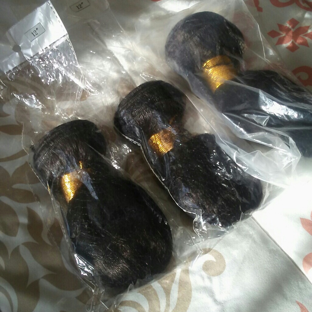 Three 12 inch bodywave Brazilian bundles
