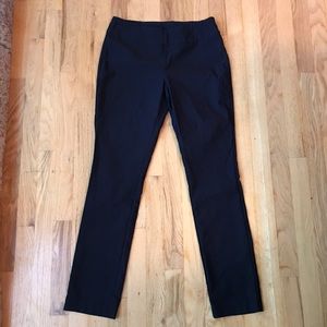 Black stretch trousers.