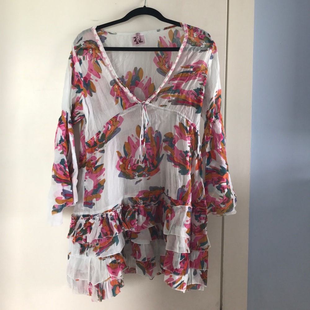 Adorable ruffled and beaded cover up